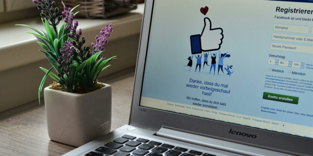 laptop with facebook login page on its screen