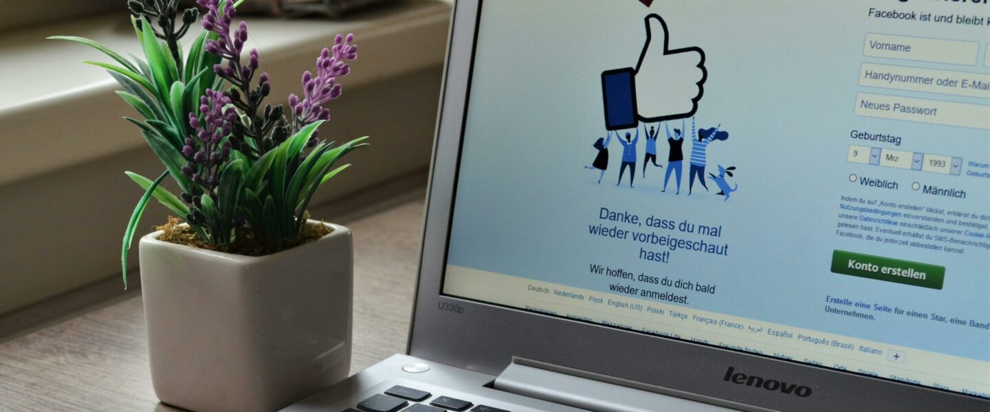 laptop with facebook login page on its screen